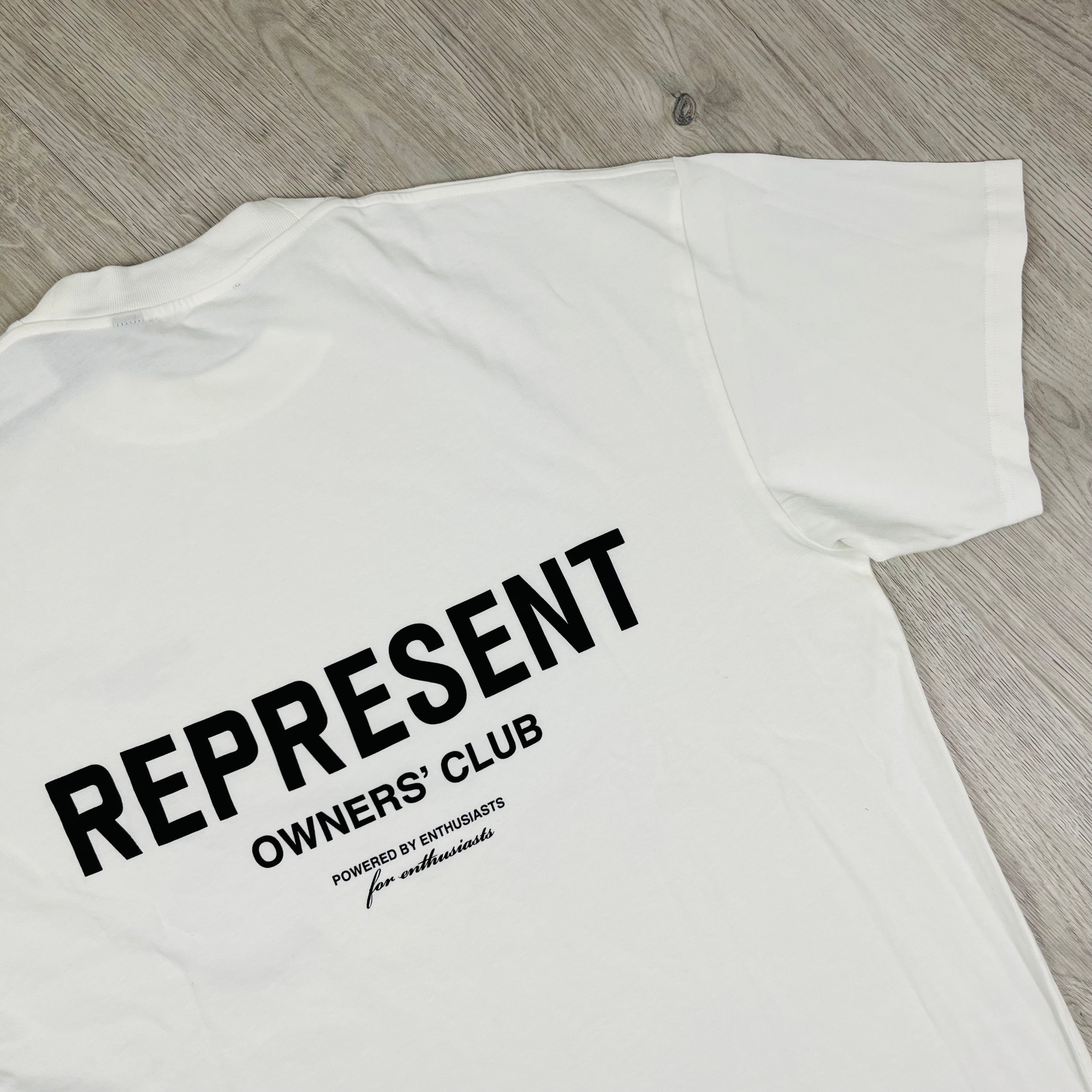 Represent 'Owners Club' T-Shirt in White. On sale at Open Attire.