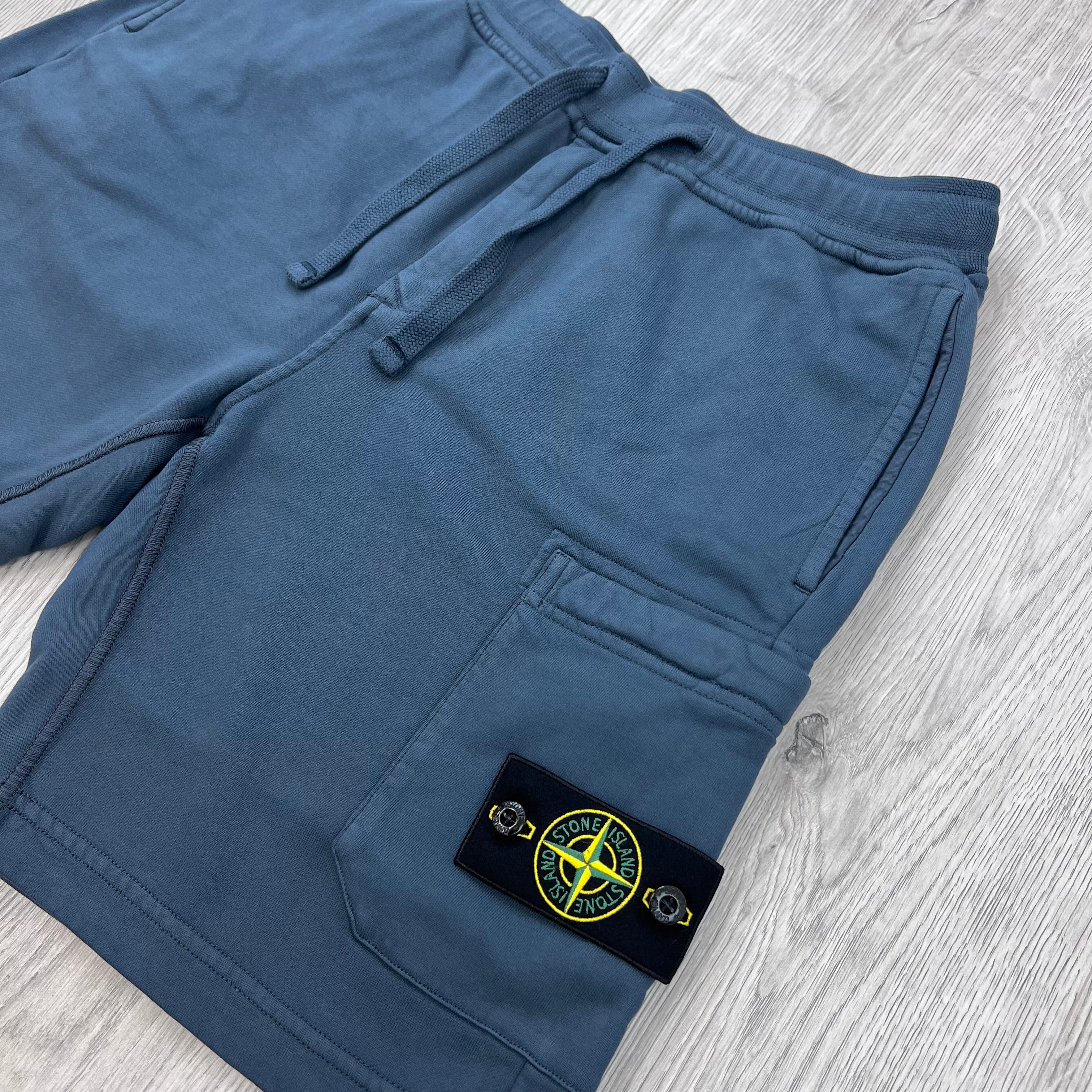 Angled view of the Stone Island Jersey Shorts in Slate Blue. 