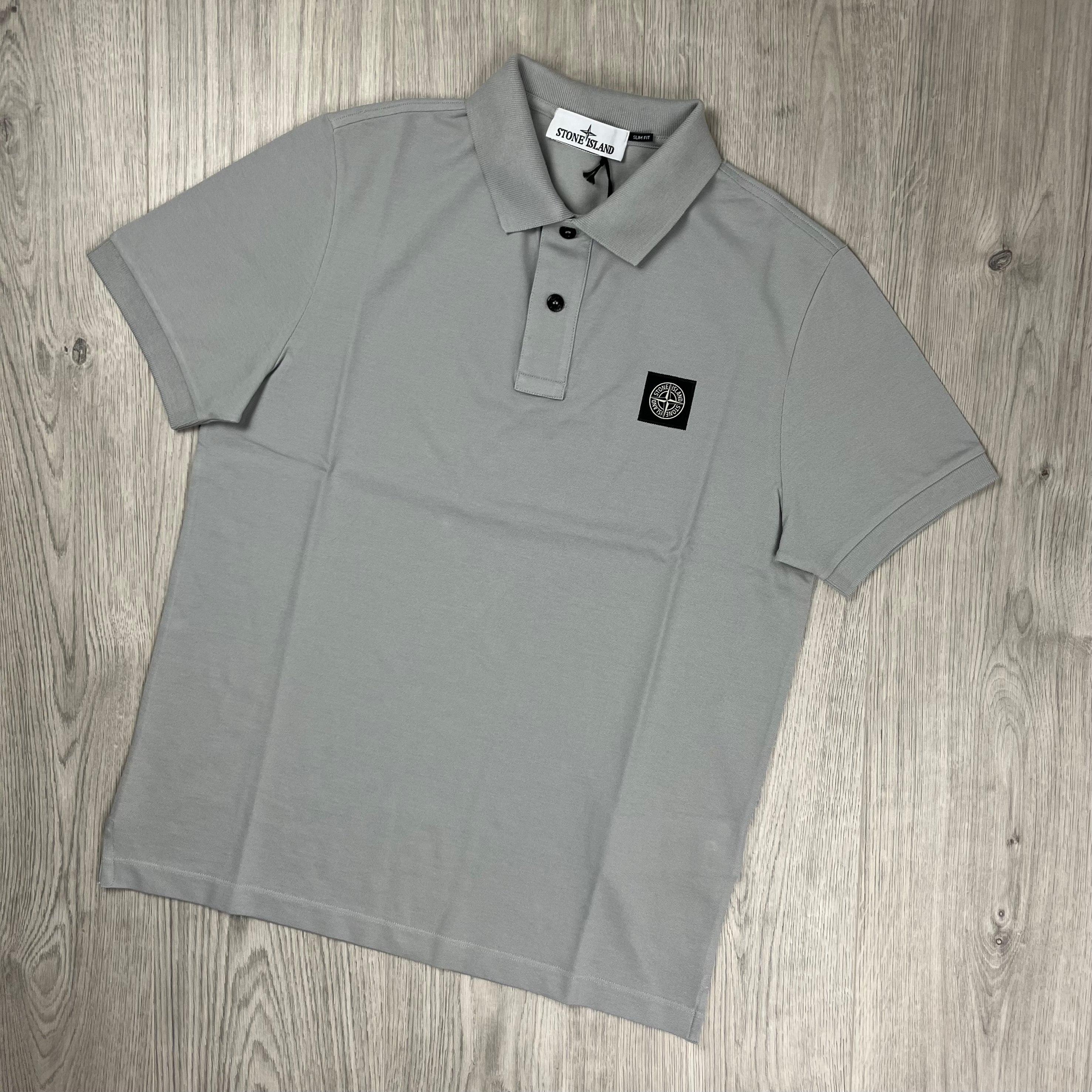 Stone Island Piqué Patch Polo Shirt in Pearl Grey. On sale at Open Attire.