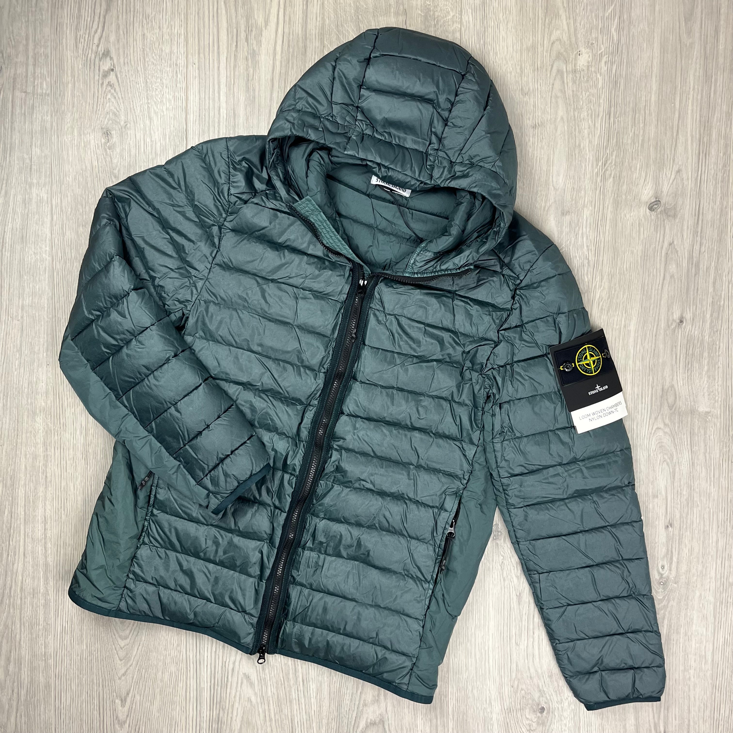 Stone Island Loom Woven Down Jacket in Bottle Green. On sale at Open Attire.