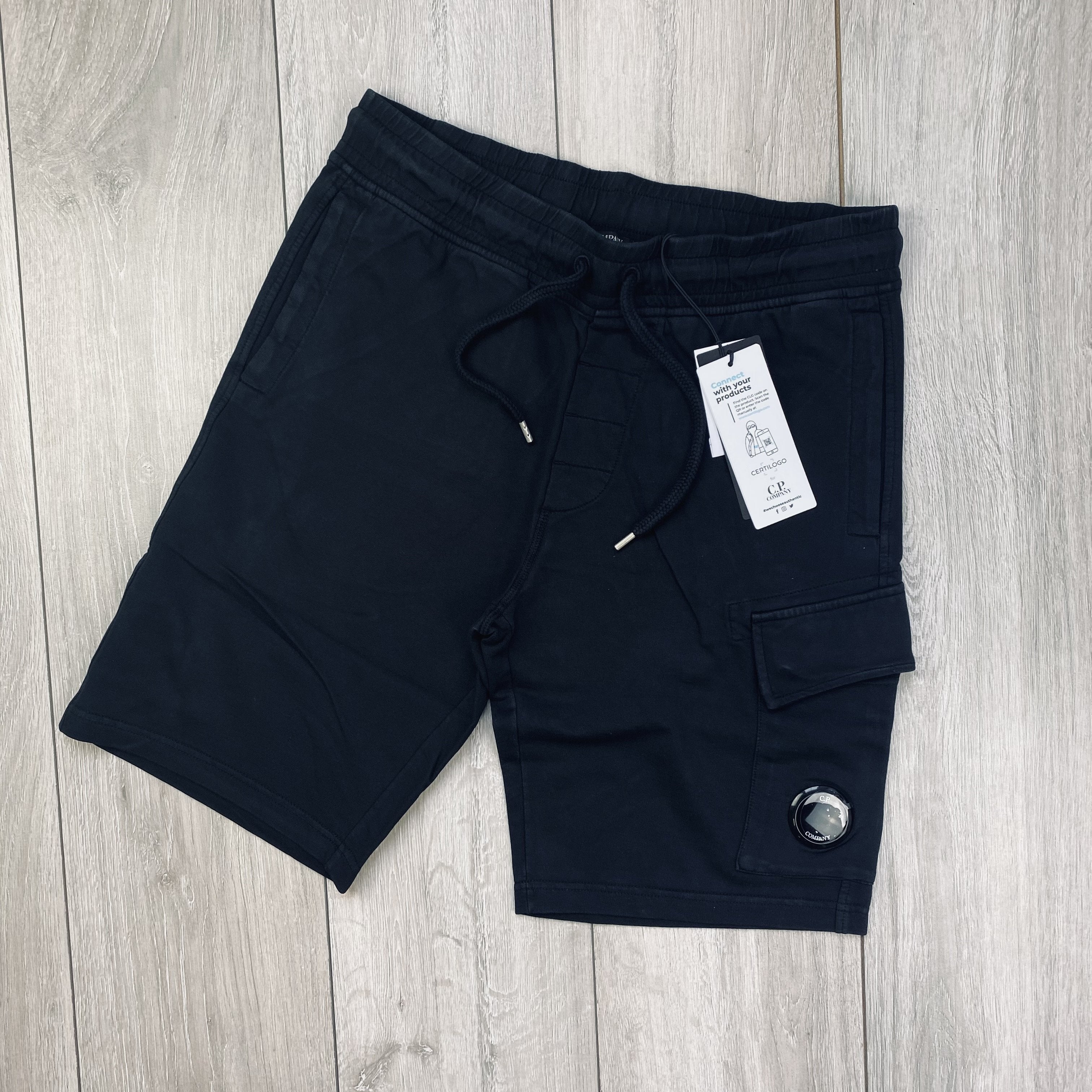 CP Company Light Fleece Jersey Shorts in Black. On sale at Open Attire.