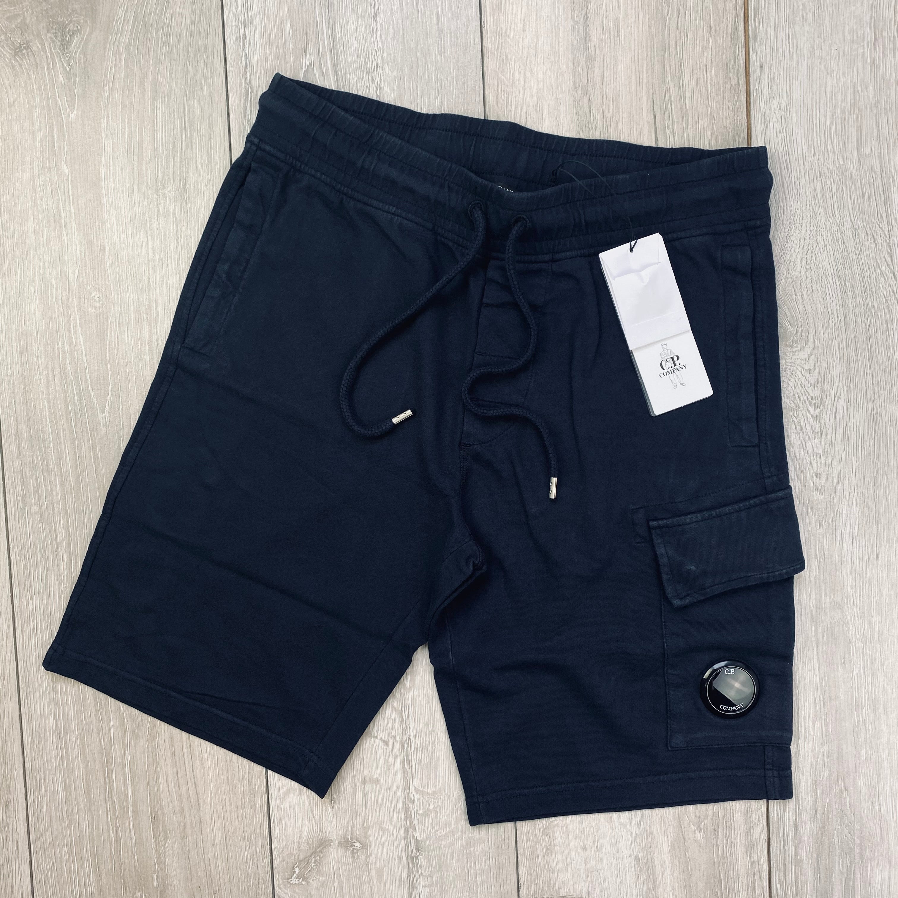 CP Company Light Fleece Jersey Shorts in Total Eclipse Navy Blue. On sale at Open Attire.